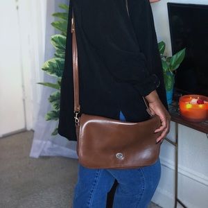 Brown leather over the shoulder bag.